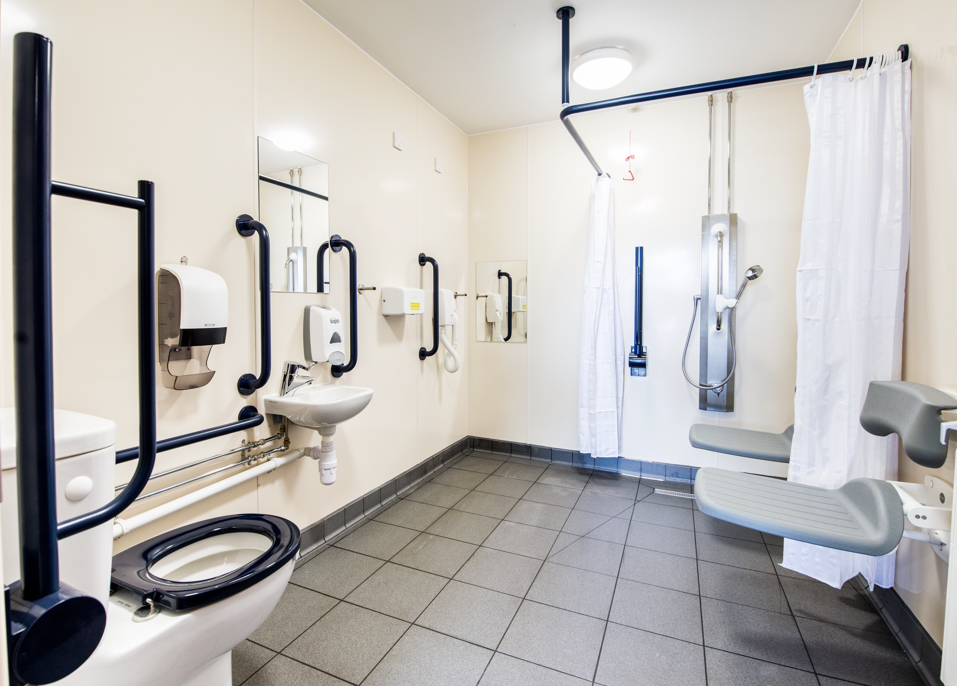 What is Light Reflective Value (LRV) and its importance in washroom design?