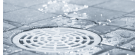 Where should the drain be placed in a shower?