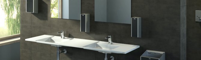 What products should I use to clean my stainless steel washroom dispensers?
