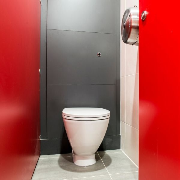 Red Cubicles in Office Washroom